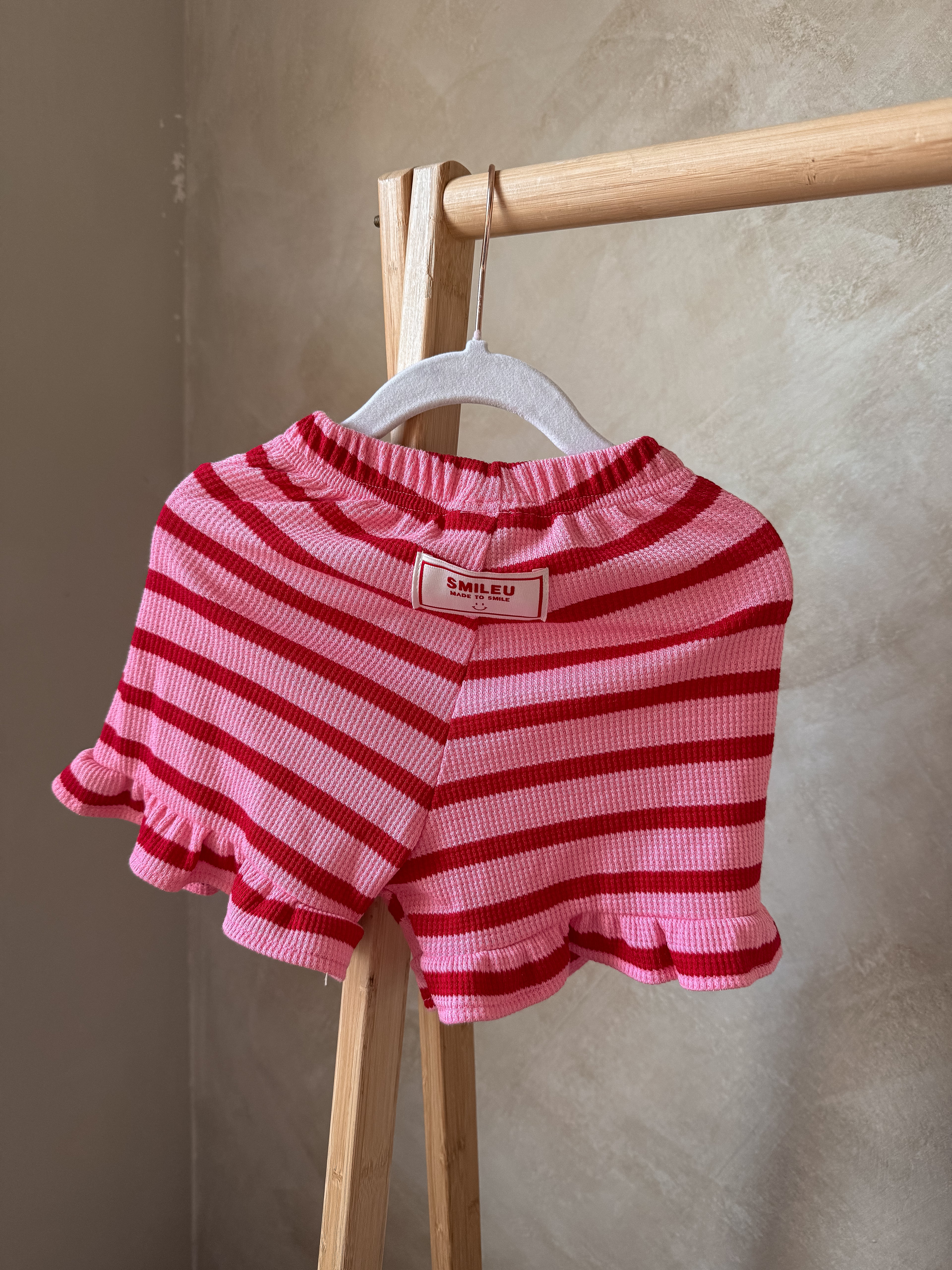 Roze / rood streep short 92/98