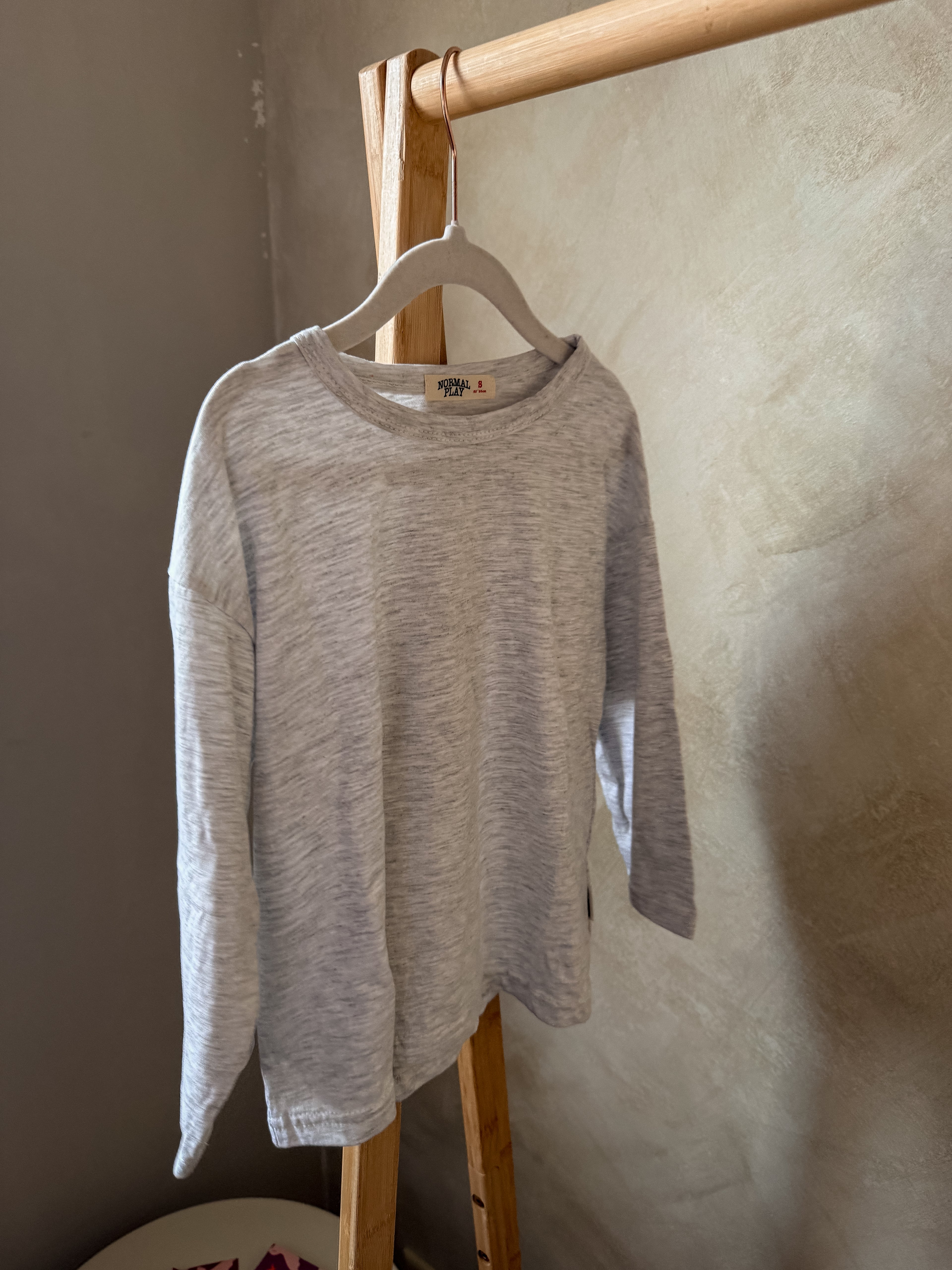 Grijze longsleeve 104/110